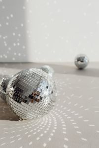 Kaboompics - New Year's Eve Background with Soft-Focus Disco Balls and Copy Space