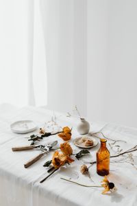 Kaboompics - Dried Flowers and Vases on White Linen with Copy Space for Editorial Design