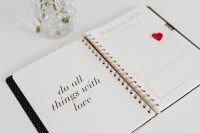 Kaboompics - Open Planner with Do All Things with Love, Red Heart and Roses, Valentine's Flat Lay