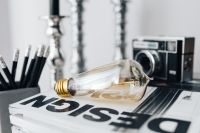 Kaboompics - Pencils, magazines and an old lightbulb