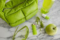 Kaboompics - Lime Green Handbag with Sunglasses, Apple and Accessories