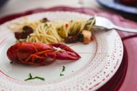 Kaboompics - Close-Up Red Crayfish with Seafood Pasta on White Plate