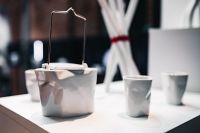 Kaboompics - White Ceramic Teapot and Cups on Display Table
