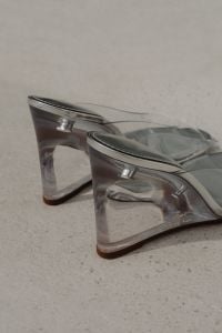 Kaboompics - Close-Up of Transparent Block Heels on a Pale Tile Floor