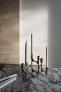 Kaboompics - Chrome Candelabra Still Life on Arabescato Marble