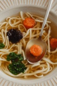 Kaboompics - Close-Up Chicken Broth with Homemade Noodles, Carrot and Parsley
