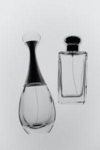Kaboompics - Minimal Glass Fragrance Bottles On White