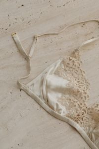 Kaboompics - Light Beige Satin Lace Bra Close-Up