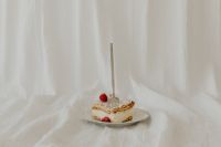 Kaboompics - Minimal Napoleonka Slice with Upright Fork and White Copy Space