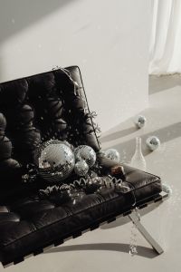 Kaboompics - Black Chair Party Still Life with Disco Balls, Cork and Glass Vase
