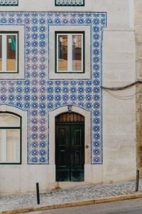 Kaboompics - Colorful wooden door in the facade of a typical Portuguese house at Lisbon, Portugal