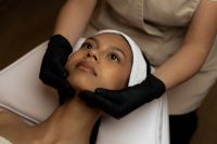Kaboompics - Facial Cleansing Treatment with Black Gloves