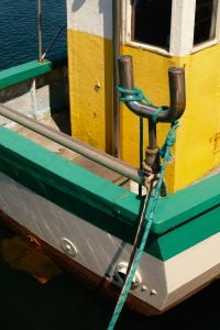 Kaboompics - Yellow Mooring Bollard on Concrete Harbor Pier