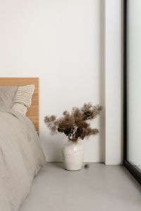 Kaboompics - Dried Flowers Beside a Minimalist Bed