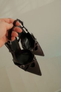Kaboompics - Hand Holding Cherry Burgundy Slingback Heels