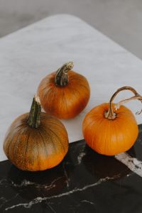 Kaboompics - Orange halloween pumpkins on marble