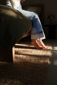Kaboompics - Woman Sitting on Bed and Enjoying a Quiet Morning