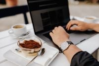 Kaboompics - Man's Watch, Laptop and Coffee at a Cafe Table