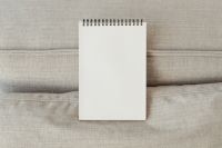 Kaboompics - Centered Open Sketchbook Mockup on a Beige Sofa
