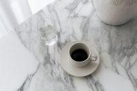 Kaboompics - Overhead Black Coffee and Water Glass on Marble Table