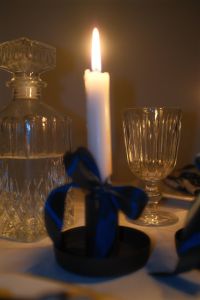 Kaboompics - White Taper Candle with Teal Satin Bow