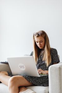 Kaboompics - Student Using Laptop in Armchair at Home