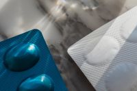 Kaboompics - Blue and White Medicine Blister Packs on Marble