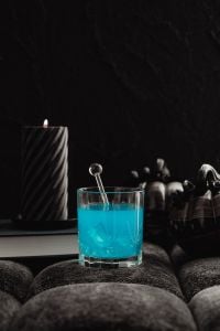 Kaboompics - Blue Halloween Drink With Black Pumpkins