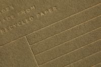 Kaboompics - Brown Recycled Paper with Embossed Typography