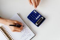 Kaboompics - Top View of Notebook, Calculator and Handwritten Notes
