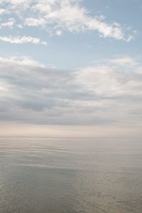 Kaboompics - Hazy Ocean Horizon Under Soft Clouds