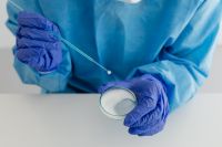 Kaboompics - Gloved Hands With Inoculating Loop and Petri Dish