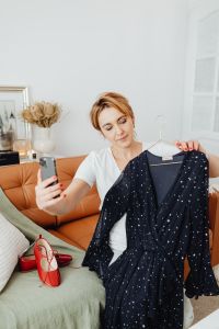 Kaboompics - Woman takes photos of products she will sell online - dress
