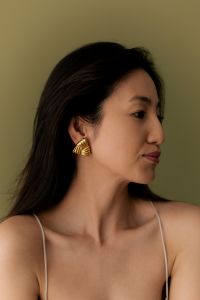 Kaboompics - Profile Portrait of Woman With Gold Earrings