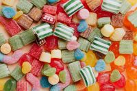 Kaboompics - Overhead Mix of Colorful Sugar-Coated Gummies and Jelly Candy