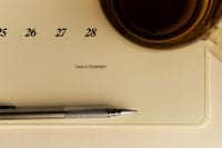 Kaboompics - Dates to Remember Calendar Page With Pen and Tea