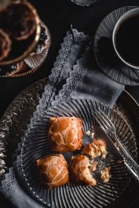 Kaboompics - Sweet Buns with Coffee and a Gray Lace Napkin