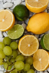 Kaboompics - Assorted Lemons, Limes and Green Grapes Fruit Background