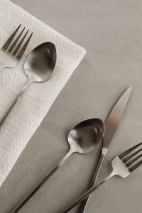 Kaboompics - Modern Cutlery Composition with White Napkin and Generous Copy Space
