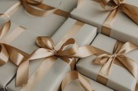 Kaboompics - White Gift Boxes with Champagne Satin Ribbon