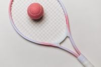 Kaboompics - Pink Tennis Ball on a Racket