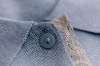 Kaboompics - Close Up of Blue Knitwear Button and Collar