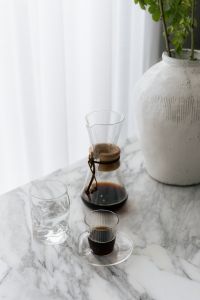 Kaboompics - Glass Chemex, Black Coffee and Water Glass on Marble Table