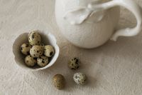 Kaboompics - White Ceramic Pitcher and Quail Eggs Still Life