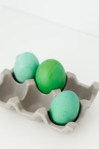 Kaboompics - Green Easter Eggs in a Paper Carton with Copy Space