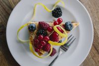 Kaboompics - Top View of Berry Cheesecake Slice with Mixed Berries