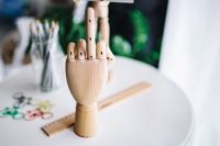 Kaboompics - Wooden hand doing gesture