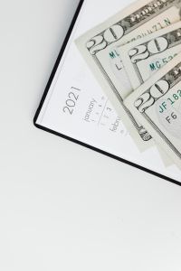 Kaboompics - U.S. Dollars Across the January 2021 Planner Page