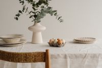 Kaboompics - Minimal Neutral Easter Table Setting With Eucalyptus