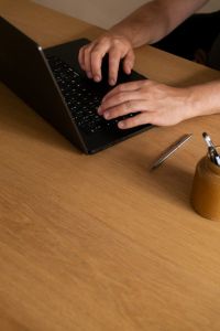 Kaboompics - Black and White Laptop Workspace with Table Lamp